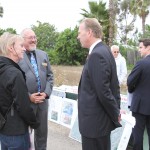 Rose Creek Watershed Manager Ann Van Leer chats with San Diego City Councilmember Kevin Faulconer and Chet Barfield from Interim Mayor Todd Gloria's office as event-goers gather. Photo by RHS Photo.