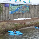 The mural is unveiled to event-goers and kayakers. Photo by RHS Photo.